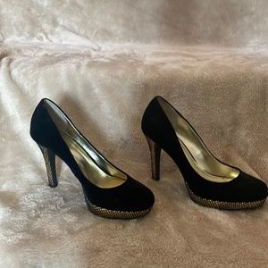 Black and gold platforms